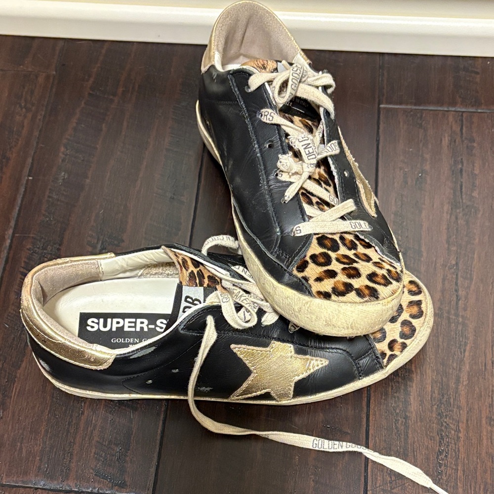 Golden Goose Black and Gold Sneakers with Leopard Print